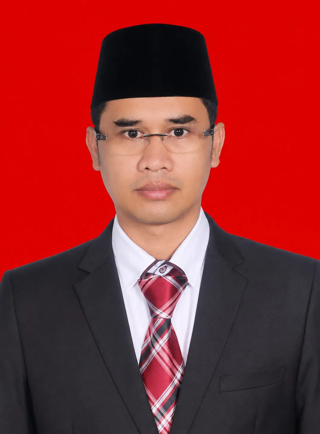 Foto H. Mokh. Jaenudin, S.Pd.I, M.H.